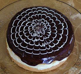The decorated top of a boston cream pie