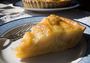 A slice of caramelized apple tart