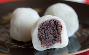 A daifuku cut in half so you can see the anko