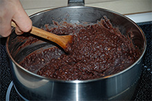 Still-wattery bean paste being cooked down