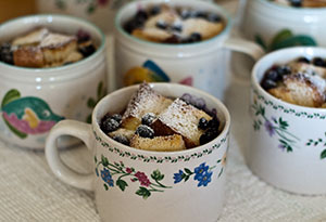 A collection of bread puddings in cups